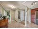 Spacious entryway with built-in storage and hardwood floors at 851 Bayway Blvd # 201, Clearwater, FL 33767