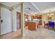 Updated kitchen with island, stainless steel appliances, and granite countertops at 851 Bayway Blvd # 201, Clearwater, FL 33767