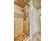 Large walk in shower with tile surround at 851 Bayway Blvd # 201, Clearwater, FL 33767