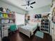 Charming bedroom with a full-size bed and plenty of storage at 9625 Fox Hearst Rd, Tampa, FL 33647