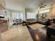 Spacious living room with hardwood floors, fireplace, and comfortable seating at 9625 Fox Hearst Rd, Tampa, FL 33647