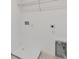 Laundry room with drain, shelving and hookups at 9804 Crescent Moon Dr, Riverview, FL 33578