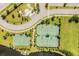Tennis and basketball courts, green spaces and walking paths at 9805 Lemon Drop Loop, Sun City Center, FL 33573