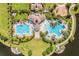 Resort-style pool and community amenities viewed from above at 9805 Lemon Drop Loop, Sun City Center, FL 33573