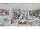 Spacious living room with a neutral color scheme and comfortable seating at 9822 Crescent Moon Dr, Riverview, FL 33578