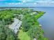 Aerial view of waterfront community with lush landscaping and private docks at 1111 N Bayshore Blvd # B7, Clearwater, FL 33759