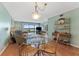 Bright dining area with glass table and water views at 1111 N Bayshore Blvd # B7, Clearwater, FL 33759