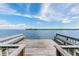 Spacious wooden dock with benches overlooking the water at 1111 N Bayshore Blvd # B7, Clearwater, FL 33759