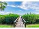 Wooden dock leading to the waterfront at 1111 N Bayshore Blvd # B7, Clearwater, FL 33759