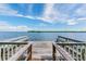 Wooden dock with benches overlooking the water at 1111 N Bayshore Blvd # B7, Clearwater, FL 33759