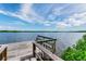 Wooden dock extending over calm water at 1111 N Bayshore Blvd # B7, Clearwater, FL 33759