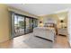 Main bedroom with water view and access to balcony at 1111 N Bayshore Blvd # B7, Clearwater, FL 33759