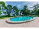 Oval pool and patio overlooking the water at 1111 N Bayshore Blvd # B7, Clearwater, FL 33759