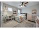 Charming bedroom with a crib and book shelves at 117 W Minnehaha St, Tampa, FL 33604