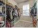 Large walk-in closet with ample shelving and hanging space at 117 W Minnehaha St, Tampa, FL 33604