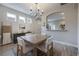 Bright dining room features a rustic wooden table with seating for four at 117 W Minnehaha St, Tampa, FL 33604