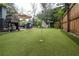 Artificial turf putting green in the backyard at 117 W Minnehaha St, Tampa, FL 33604