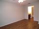 Bedroom with wood floors and en-suite bathroom at 11901 4Th N St # 10105, St Petersburg, FL 33716