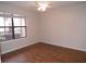 Bright bedroom with wood flooring and ceiling fan at 11901 4Th N St # 10105, St Petersburg, FL 33716