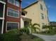 Two-toned building exterior with Spanish-style accents and neatly landscaped grounds at 11901 4Th N St # 10105, St Petersburg, FL 33716