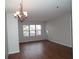 Spacious living area with hardwood floors and patio access at 11901 4Th N St # 10105, St Petersburg, FL 33716