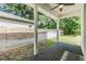 Spacious backyard deck with a wooden privacy fence at 1210 E Mohawk Ave, Tampa, FL 33604