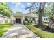 Newly renovated craftsman bungalow with a welcoming front porch at 1210 E Mohawk Ave, Tampa, FL 33604