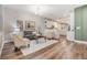 Cozy living room featuring a neutral color palette and comfy seating at 1210 E Mohawk Ave, Tampa, FL 33604