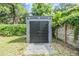 Outdoor storage shed with a paved patio area at 1210 E Mohawk Ave, Tampa, FL 33604