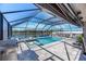 Resort-style pool and spa with covered patio at 12712 Mangrove Forest Dr, Riverview, FL 33579