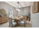 Bright dining room with rustic wooden table and chairs at 1330 Monte Lake Dr, Valrico, FL 33596