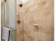 Clean shower with beige tile and glass enclosure at 1330 Monte Lake Dr, Valrico, FL 33596