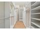 Large walk-in closet with ample shelving and hanging space at 1330 Monte Lake Dr, Valrico, FL 33596