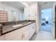 Double vanity bathroom with granite countertops at 13455 Jamaica Plank Loop, Riverview, FL 33579