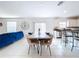 Bright dining area with table and chairs, adjacent to kitchen at 13455 Jamaica Plank Loop, Riverview, FL 33579