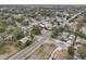 Wide aerial view of neighborhood, highlighting house location at 1424 E Bougainvillea Ave, Tampa, FL 33612