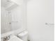 Clean bathroom with toilet, sink, and shower at 1424 E Bougainvillea Ave, Tampa, FL 33612