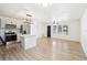 Open living space with light wood floors at 1424 E Bougainvillea Ave, Tampa, FL 33612