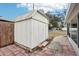 White storage shed in backyard at 1424 E Bougainvillea Ave, Tampa, FL 33612