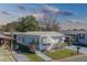 Aerial view of a white single story home at 148 Gull Aire Blvd, Oldsmar, FL 34677