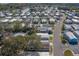 Aerial view of mobile home community with tree-lined streets at 148 Gull Aire Blvd, Oldsmar, FL 34677