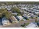 Aerial view of mobile home community, showing homes and landscaping at 148 Gull Aire Blvd, Oldsmar, FL 34677