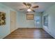 Simple bedroom with light walls and wood-look flooring at 148 Gull Aire Blvd, Oldsmar, FL 34677