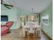 Dining area with white table and chairs at 148 Gull Aire Blvd, Oldsmar, FL 34677