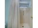 Clean shower with a white curtain and grab bar at 148 Gull Aire Blvd, Oldsmar, FL 34677