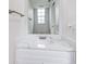 Small bathroom with white vanity and quartz countertop at 1505 Chateaux De Ville Ct, Clearwater, FL 33764