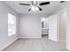 Bedroom with ceiling fan and ensuite bathroom at 1505 Chateaux De Ville Ct, Clearwater, FL 33764