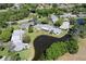 Aerial view of community with pool and lush landscaping at 1510 Palmer Ct, Palm Harbor, FL 34685