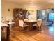 Bright dining room with hardwood floors and built-in hutch at 1510 Palmer Ct, Palm Harbor, FL 34685