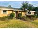 Cute condo with well-manicured landscaping and palm trees at 1510 Palmer Ct, Palm Harbor, FL 34685